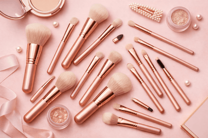 Evara Beauty 15‑Piece Ultra‑Soft Rose Gold Makeup Brush Set displayed on a pink background with accessories.